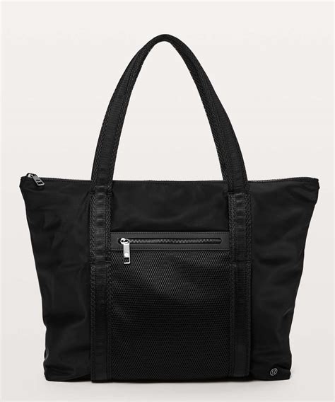 the everywhere bag dupe|travel tote with luggage sleeve.